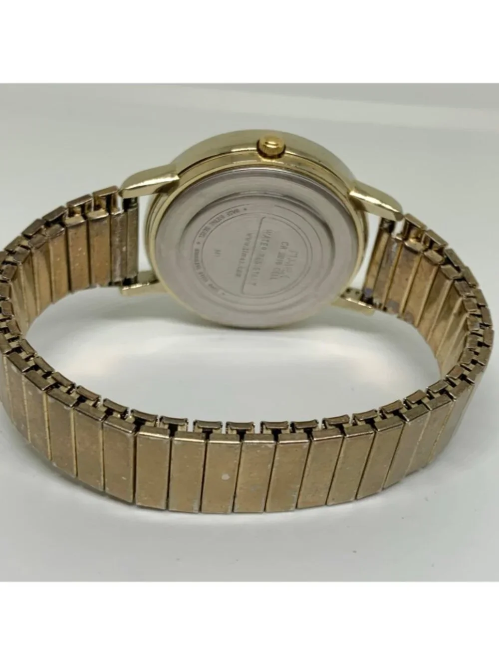 Vintage Timex day date indiglo Watch gold tone 37mm round stretch 7” running